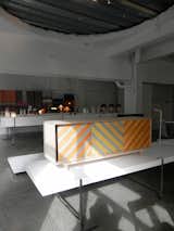 Over on the other side of town, 100% Norway exhibited a strong collection of new and old Norweigian design. 2012 marks their ninth year at LDF and their first time in the Dray Walk Gallery space in East London. Our favorite piece was the Hunter cabinet, designed by Oscar Narud, who was also responsible for the exhibition’s immaculate layout. Hunter’s bold design references traditional Norwegian timber-frame architecture.