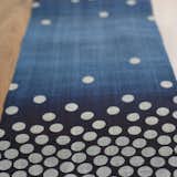 Husband-wife-studio Rowland Ricketts weaves the Hoshi table runner ($425) using traditional Japanese methods.