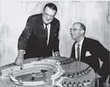 Dodgers owner Walter O’Malley shows a model of his stadium to Yankees owner Del Webb.