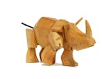 In the wild, the rhinoceros is not to be trifled with; this durable wooden version is a fitting representation of the powerful beast. Crafted from wood and ingeniously bound by hidden elastic bands, Simus is tough enough to withstand even the most boisterous play date.