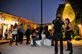 As the doors opened and night fell, the crowd began to grow. Some noshed on vegan local food truck fare while others headed for the prefab walkthrough.  Photo 4 of 20 in Dwell Party Highlights: Celebrating Prefab Design at SXSW Eco