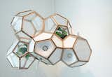 Tong's prompt to build a responsive and self-sustaining system yielded this geometrically structured air purifier.