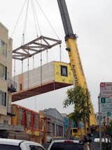 Each day four 65-foot modules were craned into place. Three modules contained a total of six units units; the fourth module contained a four-story stair atrium/elevator. This stacked up to one floor per day.