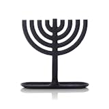 A modern take on the traditional Hannukah light piece, this cast iron menorah by Josh Owen is simple, strong, and stunning. This product can be found here