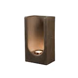 Create your own “altered” space with this handcrafted tea light totem. The piece provides a quiet moment of warm contemplation wherever it’s displayed. We suggest grouping a cluster of these for a dramatic illuminated effect on a mantle or table.
