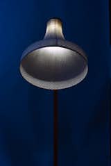 BIO 23 Honorable Mention Award winner, Amsterdam-based designer Rick Tegelaar's MeshMatic lamps demonstrate the poetic fusion of simple materials like chicken wire mesh and luminous bamboo paper. Wet bamboo fiber is formed over the mesh on wooden molds and allowed to dry – allowing for very controlled and accurate shaping.