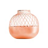 Designed by world-renowned designer Jaime Hayon and inspired by the dynamic cultural influences of Turkey, London, and Islam, these copper grid vases are contemporary in design despite their rich and rustic colors. Use these to display fresh flowers, or let them stand out as eye-catching focal pieces.