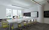 Some designs take inspiration from the professional world. The Avenues: World School in New York, a Perkins Eastman design "is a good illustration of a heavy emphasis on technology and is all about connectivity," Mellins explains. Part of an international network of schools, Avenues: World School is located in a Cass-Gilbert industrial building. Classrooms in this adapted reuse structure "look like some kind of contemporary office" with conference tables. Photo © Bonetti/Kozerski Studio.