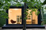 Maziar Behrooz designed this container studio set amid lush trees.