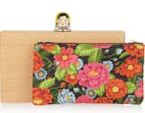 This Charlotte Olympia clutch is a true statement piece with its bright floral pouch and embellished Matryoshka doll clasp. ($696)