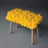 Designed by Claire Anne-O'Brian, this chunky stool is made from oversize knots that offer a squishy seat.
