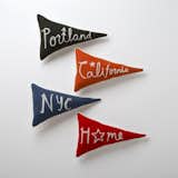 These hometown-inspired pennant pillows from Schoolhouse Electric Co. will bring a downtown-cool to any home, and the detail in the chain-stitched lettering already has us cheering. ($75)