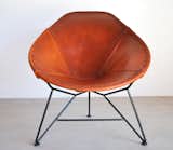 The materials do the talking on this leather and powder-coated steel chair from Garza Furniture. It exudes a rustic yet refined vibe and the caramel bucket seat will only get better with age. (price available upon request)
