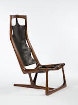 Early “Kangaroo” Chair, 1962. Walnut and leather. By Wendell Castle.