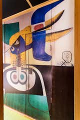 The exhibit's replica includes an original mural painted by Le Corbusier.