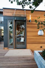 One of many thoughtful modern design touches we like is the clear screen over the front entrance.  Photo 5 of 13 in Touring the Breezehouse by Blu Homes by Sara Ost