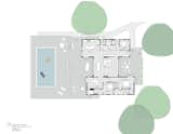 A layout of the home and grounds. The home's three modules house a library, guest room with office ("Our daughter often stays here," Cooper says), master bedroom, second bedroom, kitchen, living and dining Breezeway space, and the storage wall.