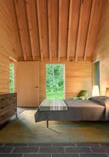 Bedroom and Bed Soranno and Cook used energy-efficient construction and modern mechanical systems in the designs and furnished the interior with pieces from Blu Dot and Knoll.  Photo 13 of 45 in casa ma by Dennis Castillo from Tiny Cabins in the Vermont Woods Commune With Nature