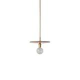 Paring an overhead light down to a simple, elemental form, the Disc Pendant Light from Workstead is an elegant light with an exposed bulb. Available in brass and blackened brass, the light consists of an arm and adjustable ten-inch disc. The light can be suspended straight from the ceiling, or the disc can be rotated to redirect light as needed.