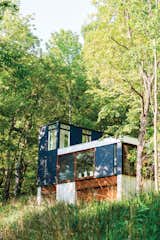 Short StackA tiny cabin in the Wisconsin Woods makes a big impact with Johnsen & Schmaling's innovative stacked design. The resulting cozy abode is stylish and durable, with stunning views of the surrounding landscape.