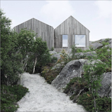 'Vega Cottage' by Kolman Boyle Architects. The foundations of this timber cabin are integrated perfectly into the craggy shoreline of the Norwegian island of Vega. The design was inspired by the fisherman's boathouses that line the island's shore.