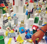 "Tons of fun with @paperpunk origami-meets-Lego toys (booth #2329) at #dod2014!"