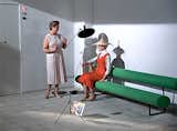 A Gumby-green tubular bench sits well next to the black pod-like floor lamp. From Mon Oncle (1958), directed by Jacques Tati