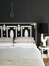 With a nod to 1700s designer Josiah Wedgwood’s jasperware pottery, this headboard designed by Eddie Ross is constructed with various moldings and a door. "It’s literal but he made it much larger and grander," says Azzarito of the striking and unusual headboard. Fun fact: Josiah Wedgwood’s daughter was married to Charles Darwin.