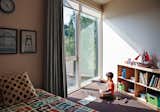 "There are floor-to-ceiling windows in almost every room," says Kaja Taft of her prefab home in Portland. "Light was a big part of why we loved this design." With so much light comes the need to block it out at times, especially in the children’s rooms. Though the couple invested in solar shades and blackout curtains by Mari Design, "They still get up at 5:30," Kaja says with a laugh.&nbsp;