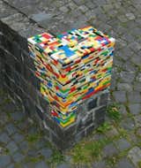 A crumbling corner is the perfect surface for a bit of Lego fortification. Via Karmadecay.