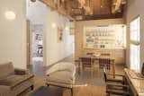 In addition to shoring up the existing structure with flood proofing and seismic upgrades, Richardson reorganized the top floor into a 1,000-square-foot residence that is wrapped head-to-toe in wood. The flooring is white stained oak.