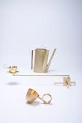 The Obstruction tea set in brass by Jeonghwa Seo.