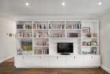 A large unit provides book and media storage in the living room.