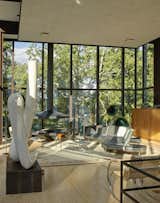Many of the homes presented in the book attempt to preserve the character of the original design, while adapting it to modern needs. Philip Johnson's Wiley house juxtaposes transparent public spaces with enclosed intimate areas.