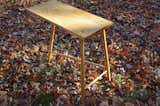 "The Springboard table ($1,100) borrows joinery from Windsor chairs to achieve the same end of strength with slightness of structure," says Mails.