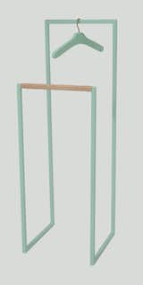 Valet stand Herrbetjent by 

Scherlin has a metal frame coated in pastel green, with details in leather and brass.
