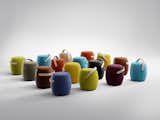 Offecct offers a playful portable seating solution with its Carry-On by designer Mattias Stenberg. It is a contemporary take on the pouf with a solid wood handle that makes it easy to take with you. The Carry-On is stackable and comes in a wide range of colors.