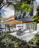 Architect Allan Shulman tackled one of Miami’s biggest architectural challenges when he designed a two-story home on a leafy lot dominated by a "solution hole," a depression in the limestone terrain caused by erosion. Inspired by the jungle scenery of painter Henri Rousseau, Shulman strove to leave the delicate habitat undisturbed. An elegant pool and outdoor kitchen extend from the living areas.