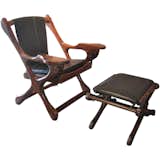 Don Shoemaker Rocking Chair and Ottoman

As heir to the General Foods fortune, Don Shoemaker might have been protected from joining the Army in World War II, yet he chose to serve, and even spent time as a prisoner of war. Once released, Shoemaker relocated to Michoacán, Mexico, and set up a furniture studio, Senal, where he produced wood-and-leather furniture from locally sourced materials. This rosewood-and-black-leather rocking chair and ottoman, probably from the 1970s, includes playful touches like bulbous end notes, engraved hinges, decorated nails holding the leather on the back, and unique rosewood dowels. $5,800 for the set from 

Sputnik Modern