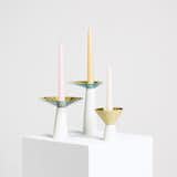 Upgrade your holiday table with the Asymmetrical Candle Holders by Umbra Shift. These candle holders are a functional work of sculpture; the bowl-like silhouette of the holder is designed to reflect light and catch wax drips. And when the holder stands without a candlestick, it creates a striking accent for a tabletop or mantel.