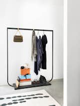 Many small studios and loft spaces don't have room for closets at all. The Tati Coatrack epitomizes how Swedes design best: Form meets function with the help of quality materials—in this case, metal frame, stone base, and brass details.