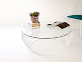 The substantial Glass Top Coffee Table will make a striking focal point in a living room or den. Available in elegant copper or modern white powder coat, this table is the epitome of Bend’s design focus—to create innovative products that improve on existing furniture types. The table can be used for its defined purpose, and can also be used as an unexpected dining table with comfortable floor cushions.