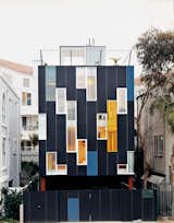 Architect Lorcan O’Herlihy created a remarkable residence for himself and his wife, Cornelia, just off Pacific Avenue in Venice, California. Photos by: Misha Gravenor  Photo 3 of 8 in These 8 Unusual Windows Will Take You by Surprise from Ways to Use Fiber-Cement Panels