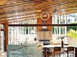 Inside Addition Although architect Michael O'Sullivan's exterior options were limited due to local building codes, he and interior designer Yvette Jay compensated with a show-stopping interior replete with rich, herringbone ceilings and special glass touches.