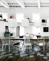 Industrial Designer World-renowned designers Paola Navone renovated a centuries old former tobacco factory in Spello, Italy. The residents and Navone take us through the home and its industrial, yet whimsical interiors.