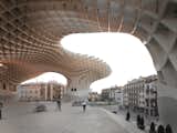 The Metropol Parasol by J. Mayer is an undulating structure made mostly of wood that twists and turns over a public square in Seville, Spain.  Photo 5 of 9 in Truly Imaginative Buildings Around the World by Allie Weiss