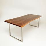 Whether you’re serving hot dogs or coq-au-vin, this dining table from Voos is a beautiful blend of warm black walnut and cold stainless steel, making it a perfect pick for rustic-modern design sensibilities.