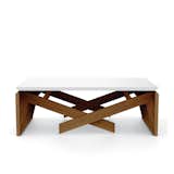 The MK1 from Duffy London morphs from a coffee table into a dining surface twice the size, all in two swift motions.