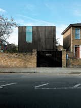 The Sunken House, so-named for its excavated site, is a dark, cedar-clad cube in a stuffy part of town. Read more about this perfect London plot here.  Photo 15 of 17 in All Black Everything by Sang Koh