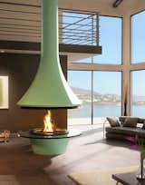 This highly modern mint green 992 Eva Central Fireplace is by French company JC Bordelet. If The Jetsons had a fireplace, this would be it. Via JC Bordelet. (Pin)